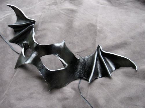 A bat-winged mask in black leather